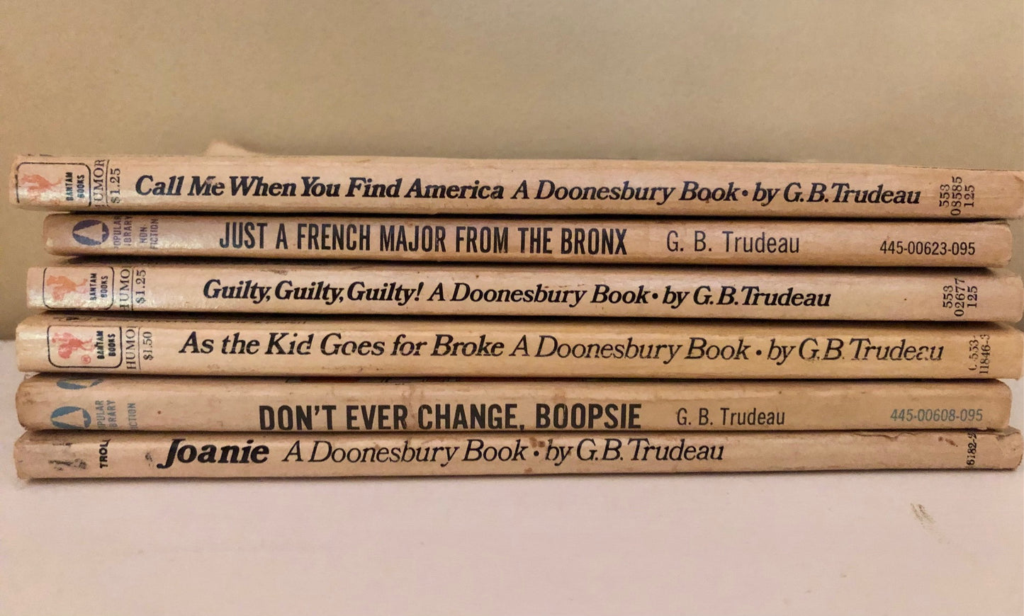 6 G.B. Trudeau Doonesbury paperback books